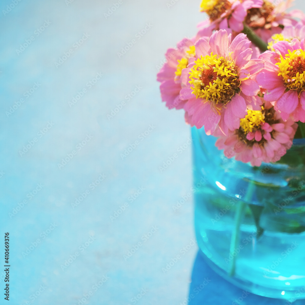Light and airy Zinnia flower bouquet, fresh flowers for spring season background with copy space.