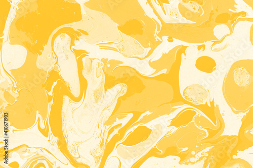 Yellow luxury marble ink texture on watercolor paper background. Marble stone image. Bath bomb effect. Psychedelic biomorphic art.