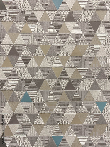 Ornament of various triangles with tiles, wallpaper background texture