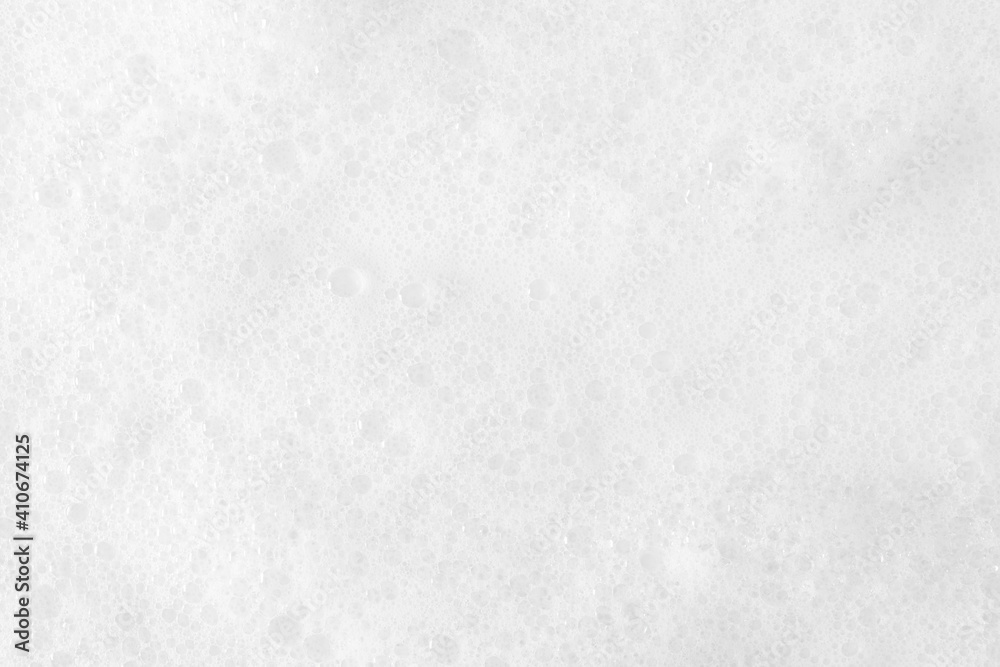 White foam background. Washing with soap, foam. Close Up with froth soap on white background. Flat lay, top view, copy space