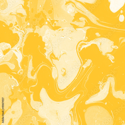 Yellow luxury marble ink texture on watercolor paper background. Marble stone image. Bath bomb effect. Psychedelic biomorphic art.