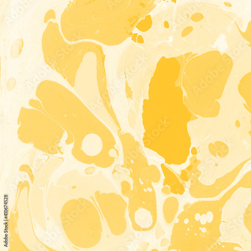 Yellow luxury marble ink texture on watercolor paper background. Marble stone image. Bath bomb effect. Psychedelic biomorphic art.