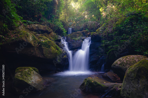 water fall in deep forest on the mountain in Thailand is paradise very beautiful natural landscape background.