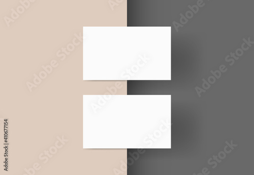 White business cards isolated on beige and grey colour background, Blank business cards template, Vector illustration. © KICKINN