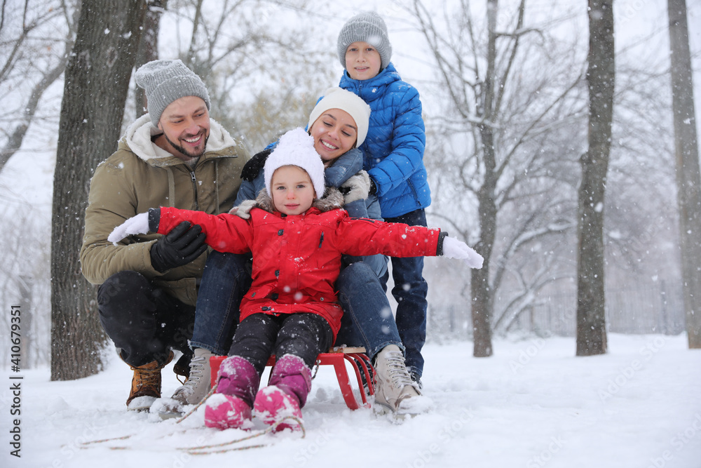 Portrait of happy family outside on winter day. Christmas vacation Portrait of happy family outside on winter day. Christmas vacation