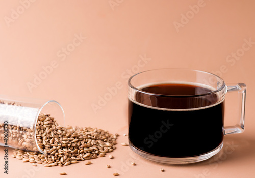 Decaffeinated coffee drink made from cereals on beige background