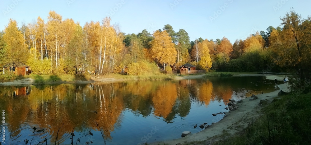 Autumn forest lake in Ural forest. Nature background. Copy space Autumn forest lake in Ural forest. Nature background. Copy space