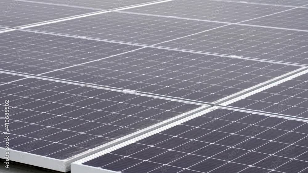 Solar panels on the roof of an industrial warehouse. Energy efficiency for a more sustainable and environmentally friendly world. Solar panels on the roof of an industrial warehouse. Energy efficiency for a more sustainable and environmentally friendly world.