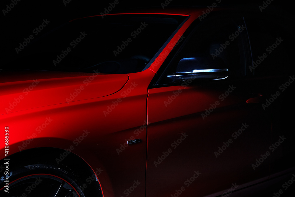 Red Sports Car in Dark
