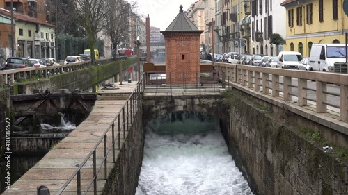 Europe, Italy , Milan February 2021 -  Leonardo Da Vinci closed water dam construction in Navigli Canals during Covid-19 Coronavirus lockdown - downtown empty of tourists  photo