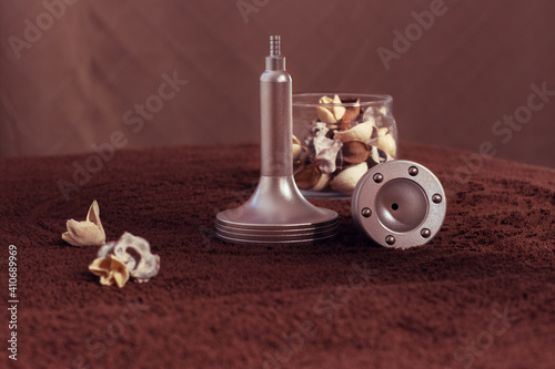 Spa compositin with handl tools for vacuum massage above brown textile background photo