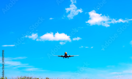 airplane Landing at Phuket International airport in sunny day
