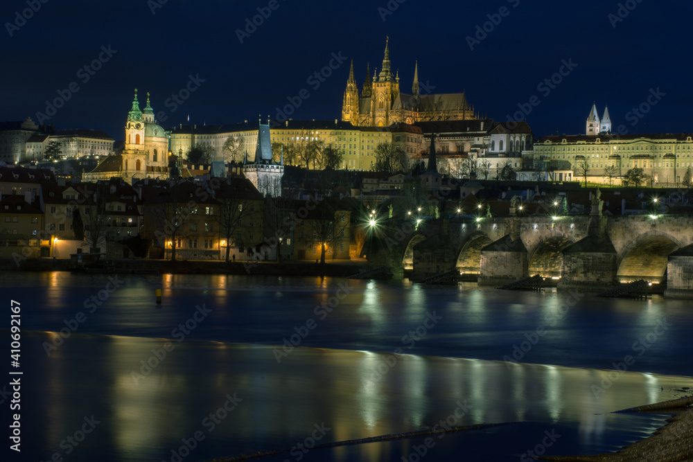 Charles Bridge and old Prague's nighty panorama.