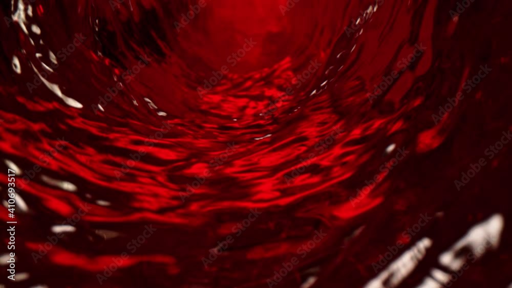 Super Slow Motion Shot of Red Wine Wave at 1000 fps.