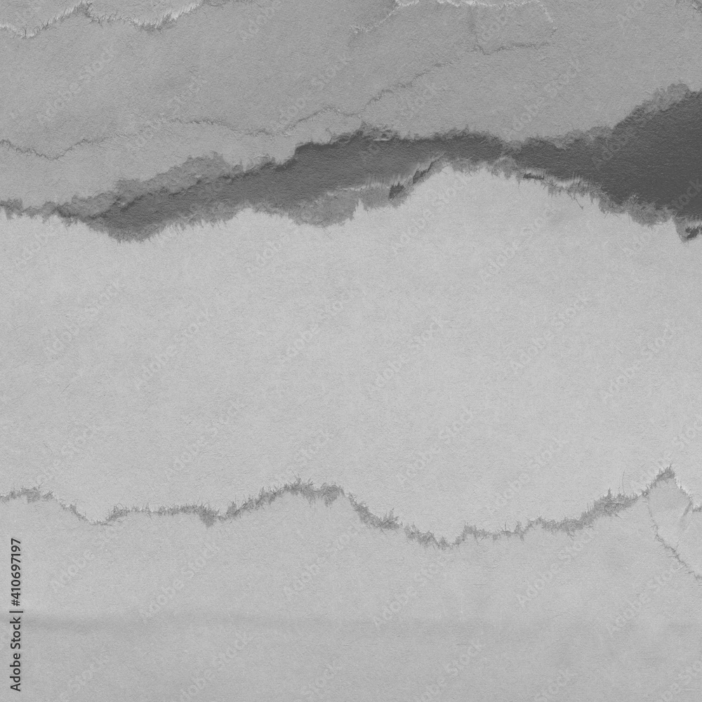 Obraz premium White torn paper collage close-up. Texture made from various paper and cardboard parts. Damaged old paper background. Vintage blank wallpaper. Material design backdrop.