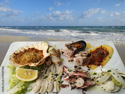 fish dish with sea background fish dish with sea background