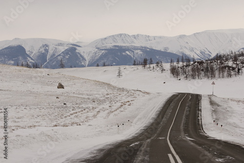 Road in the mountains. Winter travelling concept