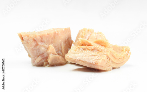 Pieces of tuna isolated on white background. Preserved and prepared fish meat