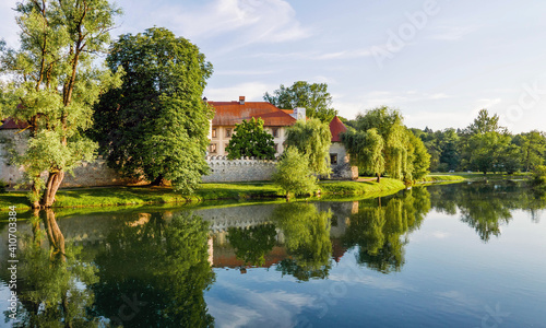 Beautiful castle by river. Spring, summer, landscape, landmark. Otocec, Slovenia. photo