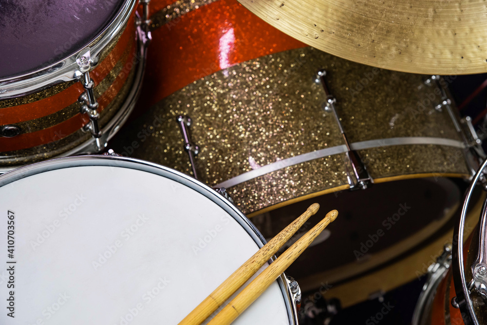 Obraz premium Closeup of drumsticks lying on the professional drum set. Drummer equipment. 