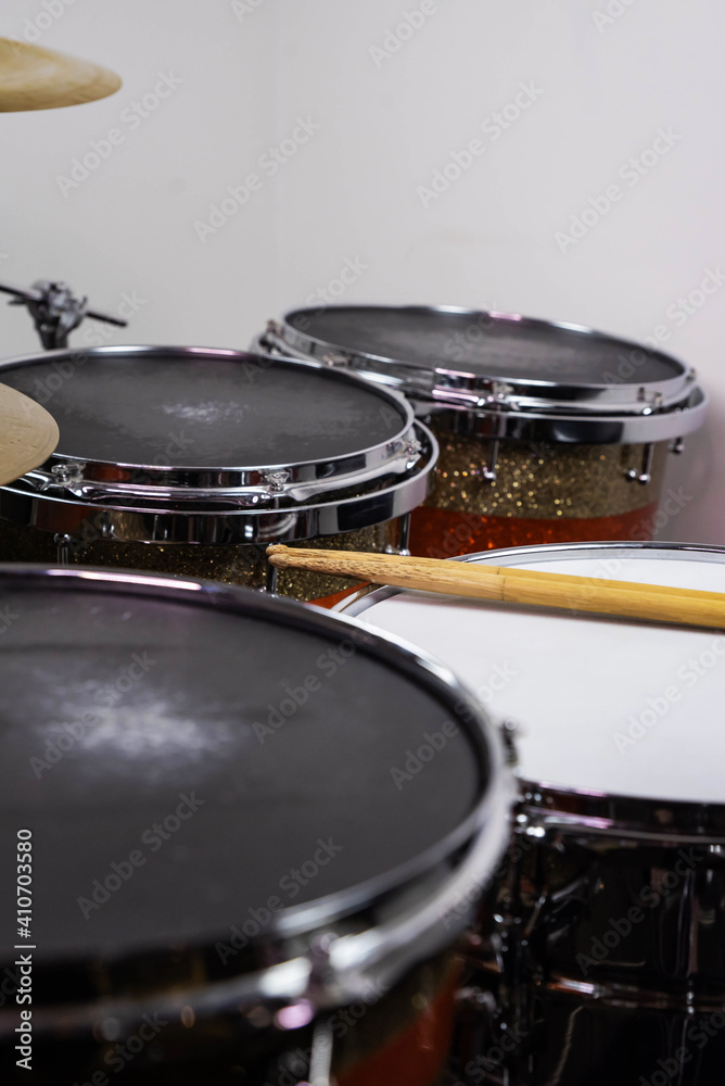 Obraz premium Closeup of drumsticks lying on the professional drum set. Drummer equipment. 