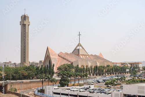 National Ecumenical center, a Christian building for religious ceremonies, in modern architecture style with spiked roof and cross shaped bell tower in Abuja, Federal Capital Territory, Nigeria