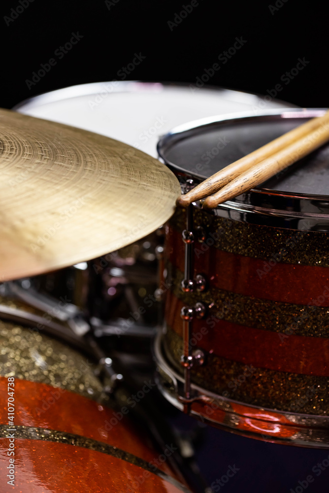 Obraz premium Closeup of drumsticks lying on the professional drum set. Drummer equipment. 