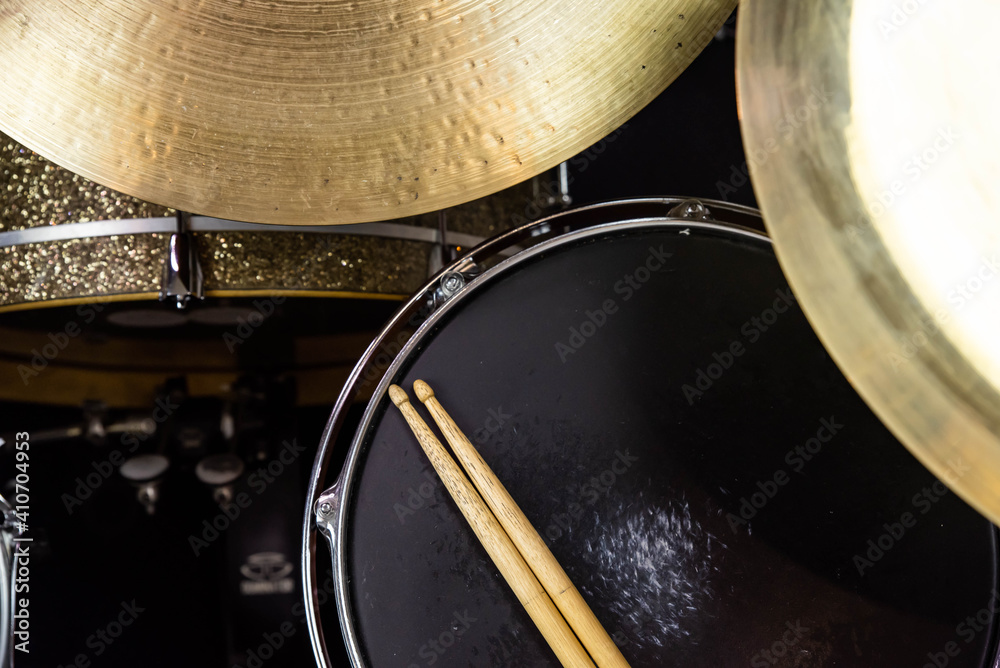 Obraz premium Closeup of drumsticks lying on the professional drum set. Drummer equipment. 