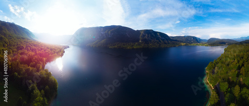 Beautiful wide Panoramic view of Lake and Mountains covered with forests  Aerial  From Drone. Summer day. Nature background large format