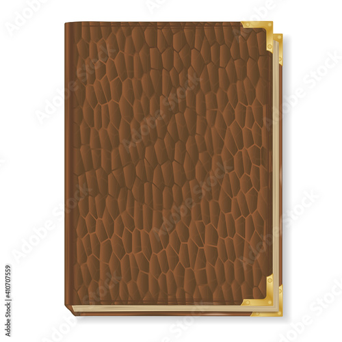 an old book with a brown leather cover with gold corners © pal1983