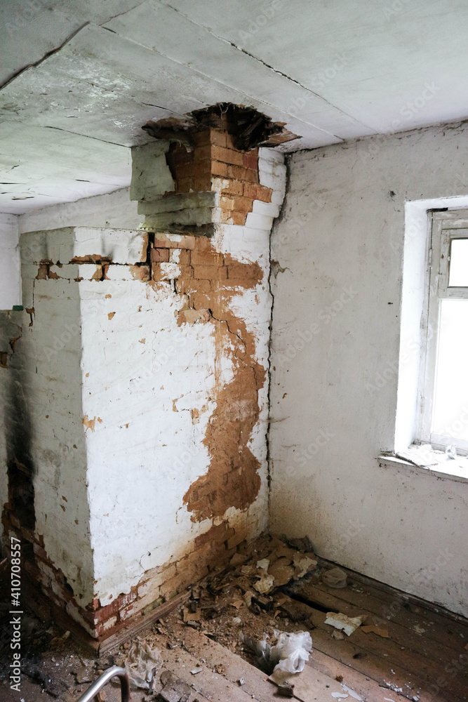 interior of old abandoned house in russian outback with forgotten things