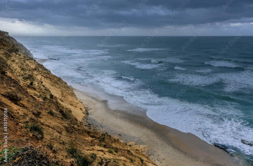Arsuf cliff, a kurkar sandstone cliff reserve towering high above the Mediterranean sea coastline between Herzliya and Netanya towns, Israel. Arsuf cliff, a kurkar sandstone cliff reserve towering high above the Mediterranean sea coastline between Herzliya and Netanya towns, Israel.
