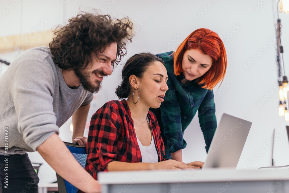Group of multi ethnic colleagues discussing helping out each other. Marketing concept. Multi-ethnic society..
