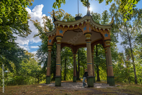 The Chinese Pavilion building on hill in Hagaparken park in Solna, northern Stockholm, Sweden.  photo