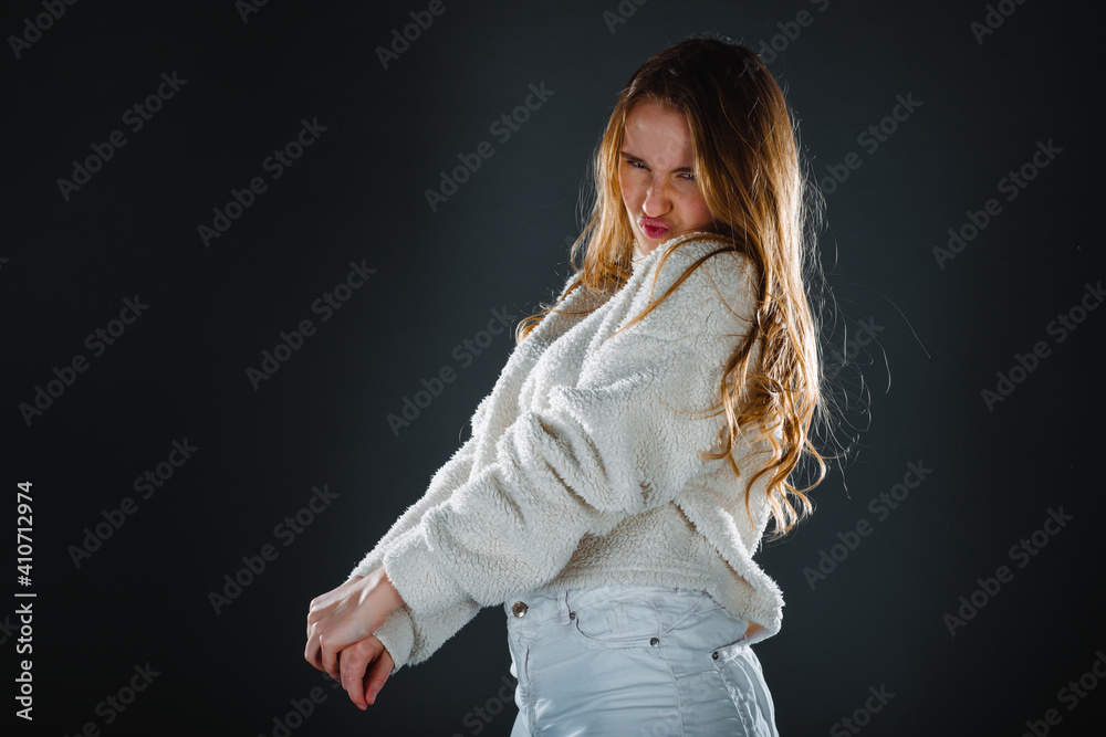 Fashionable young woman, studio fashion shot
