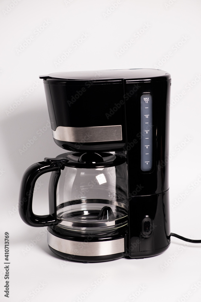 Drip coffee maker with glass pot on white background Drip coffee maker with glass pot on white background