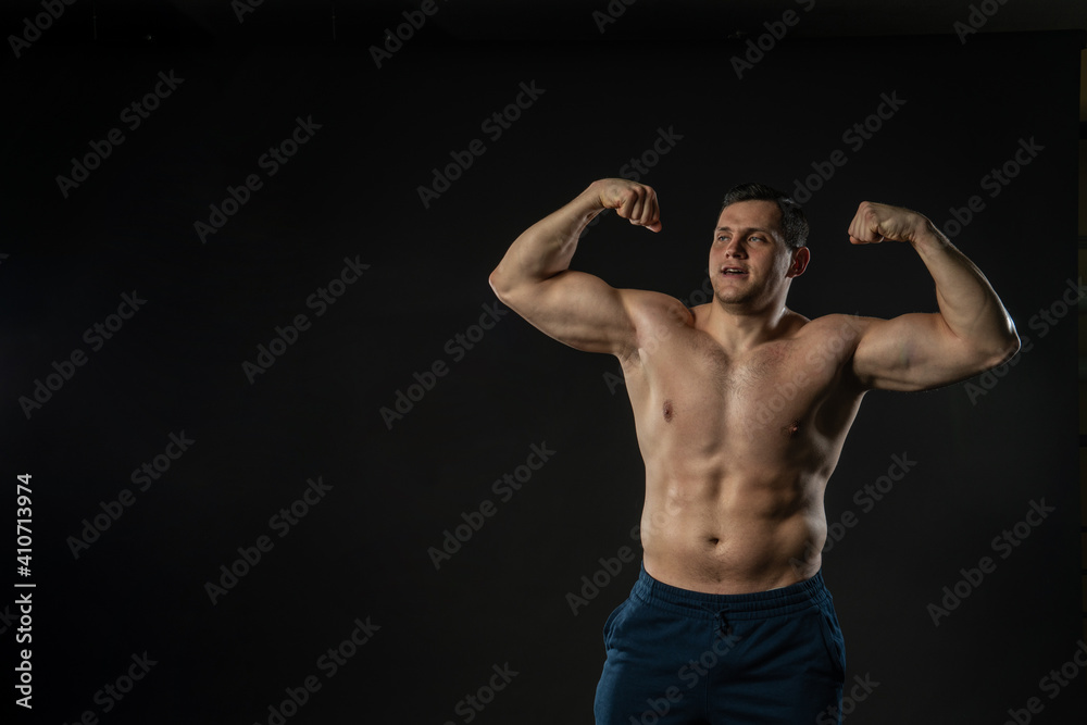 Man's biceps shows bare torso Young man confident style young confidence the contents, the success of elegance background black bodybuilder Man's biceps shows bare torso Young man confident style young confidence the contents, the success of elegance background black bodybuilder
