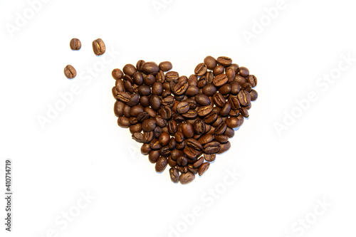 heart shaped coffee beans on white background