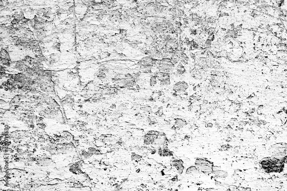 Fototapeta premium Texture of a concrete wall with cracks and scratches which can be used as a background