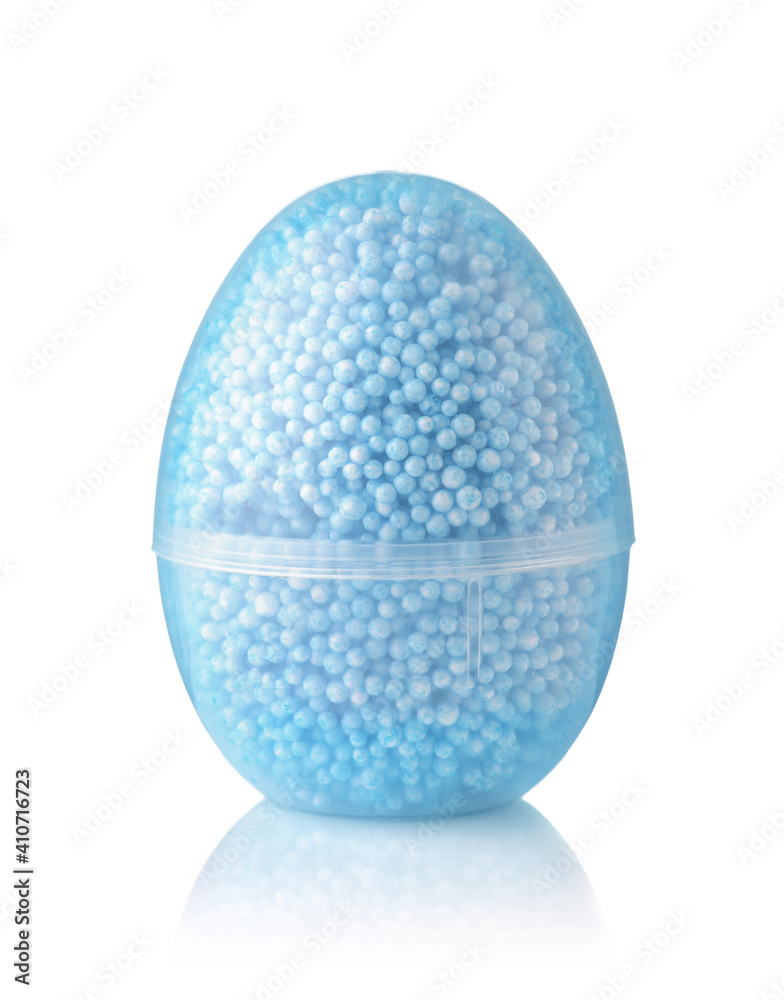Front view of transparent egg container of blue modelling foam beads Front view of transparent egg container of blue modelling foam beads