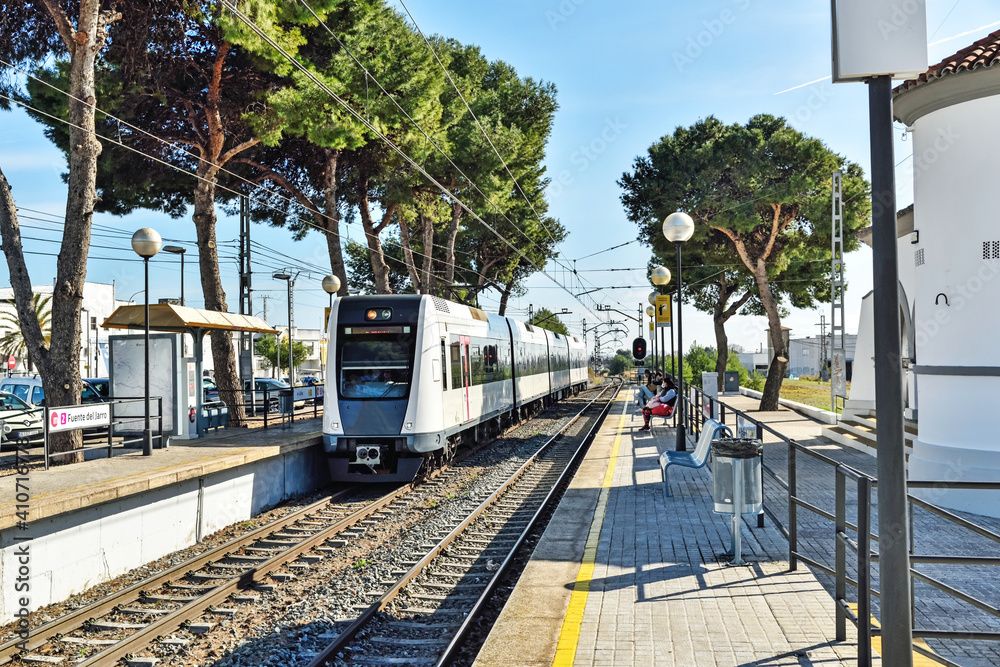 Paterna, Valencia, Spain: 01.26.2021; The train coming to railway station Paterna, Valencia, Spain: 01.26.2021; The train coming to railway station