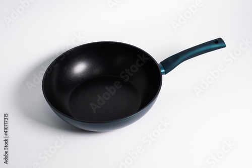 black frying pan isolated on a white background