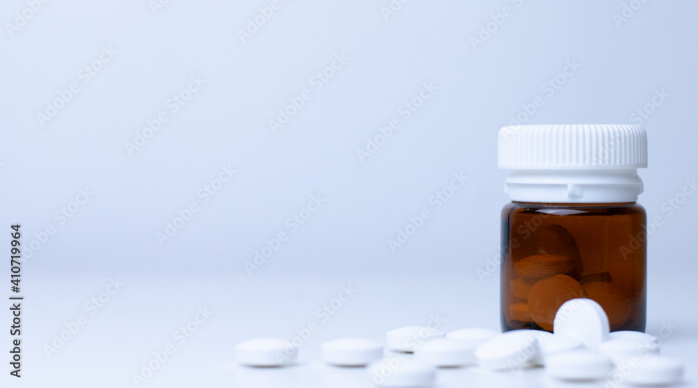 medicine bottle with pills on the white background medicine bottle with pills on the white background