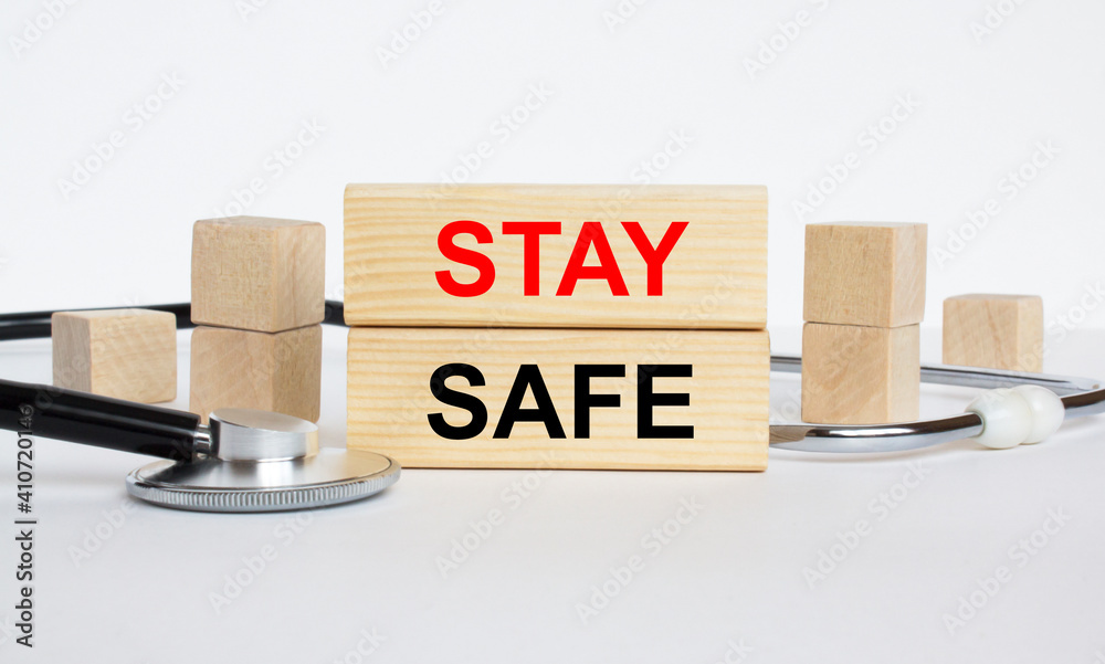 Wooden blocks with text Stay Safe with stethoscope