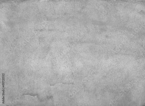Watercolor light gray background texture. Monochrome backdrop. Stains on paper.