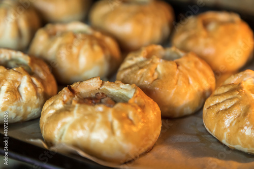 Group of individual pies with meat and potato - vak balish.