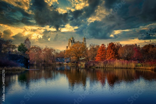 autumn landscape next to lake and reflection