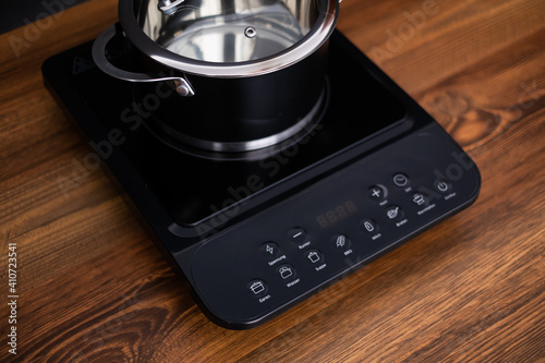 Close up view of an electrical kitchen induction ceramic hob.