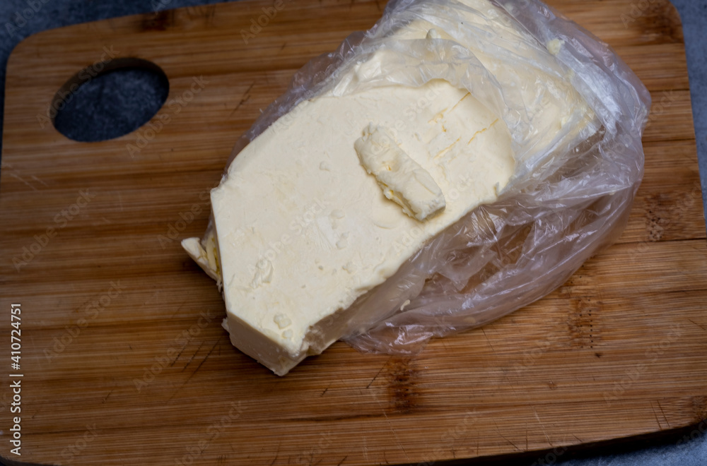 a piece of white cow butter a piece of white cow butter