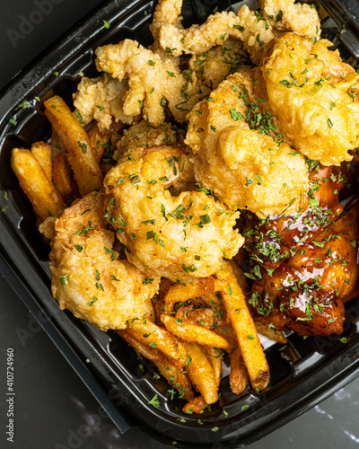 Shrimp, wings and fries